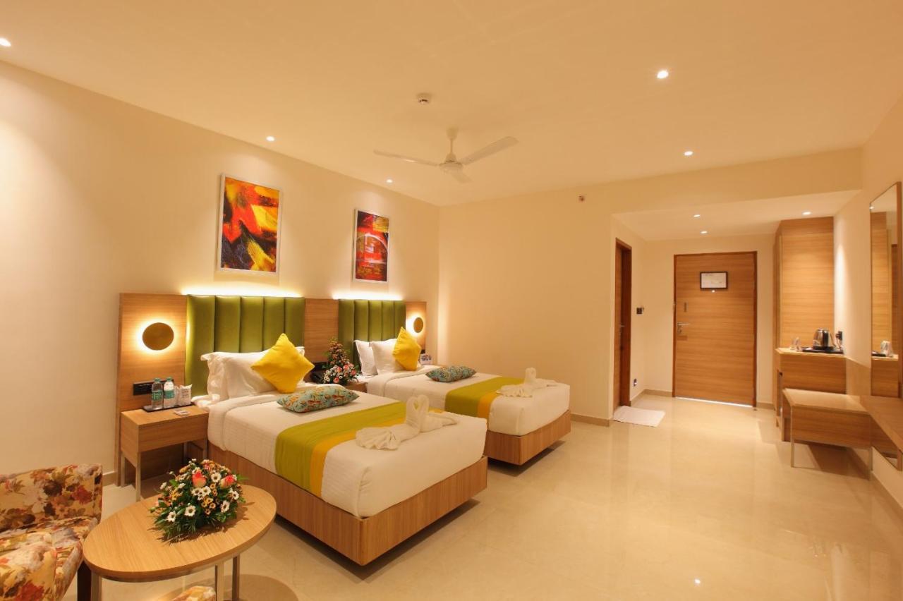 The Grand Ambassador Hotel Kottayam Extérieur photo